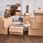 Cardboard,Boxes,Piled,In,An,Apartment,,Indicating,Moving,Day,With