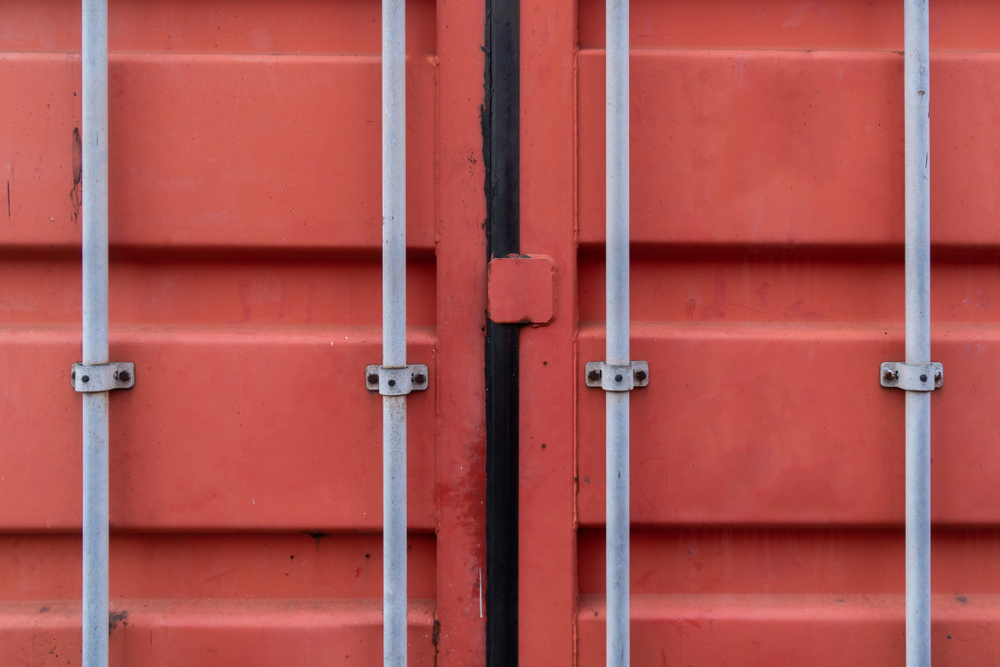Close-up,,Doors,Red,Container,Shipping,Yard.