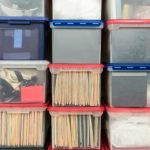 Stacked,Plastic,File,Storage,Boxes,With,Folders,,Binders,And,Miscellaneous